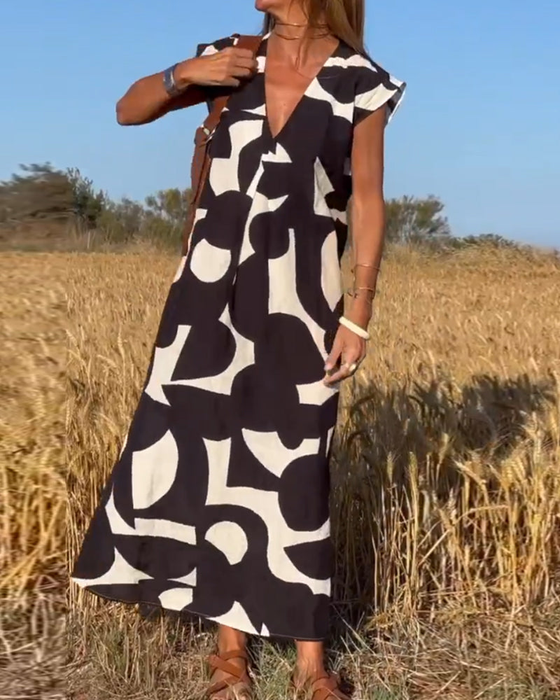SITA™ | Elegant Dress with Print and V-Neck