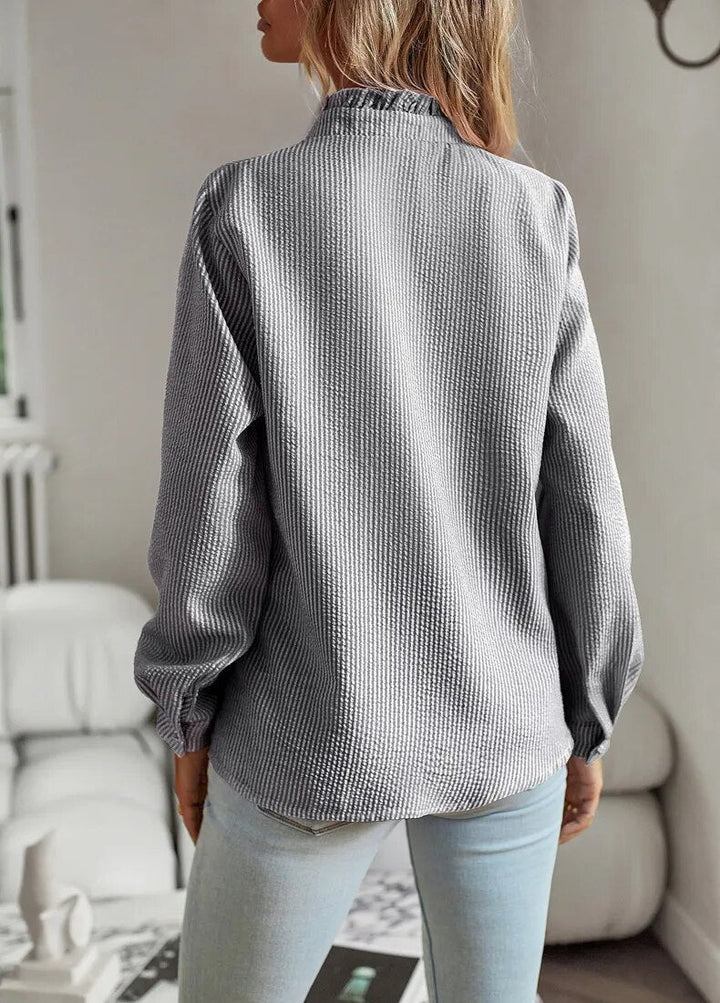 Edith | Elegant blouse with romantic ruffles
