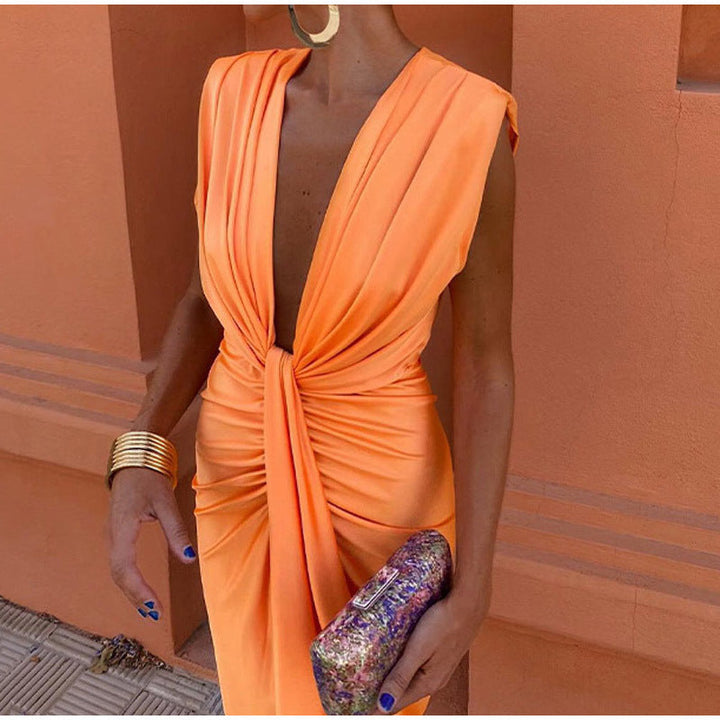 Crocetta™ | Elegant dress with a deep neckline