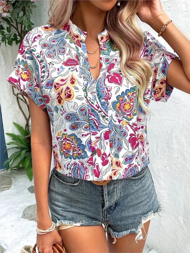 Loraine | Colorful blouse with playful print