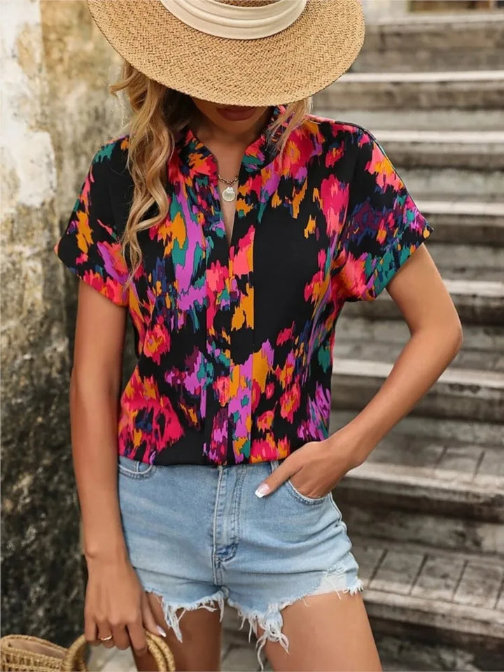 Loraine | Colorful blouse with playful print