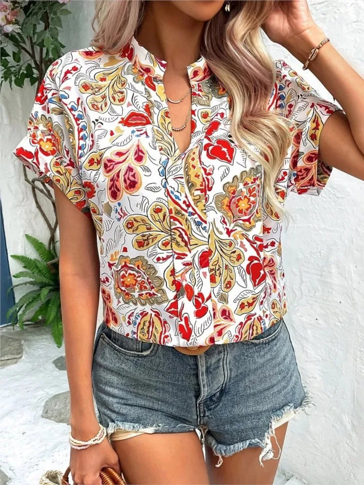Loraine | Colorful blouse with playful print