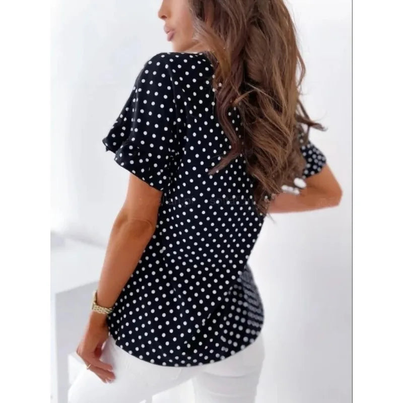 Velia | Charming blouse with polka dot print