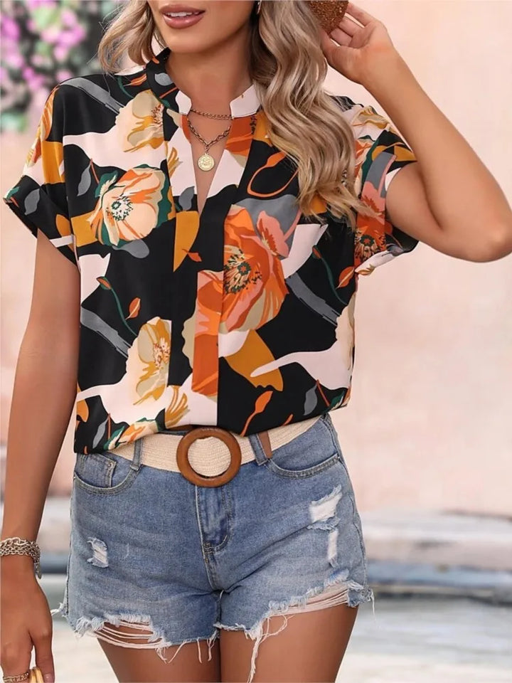 Loraine | Colorful blouse with playful print