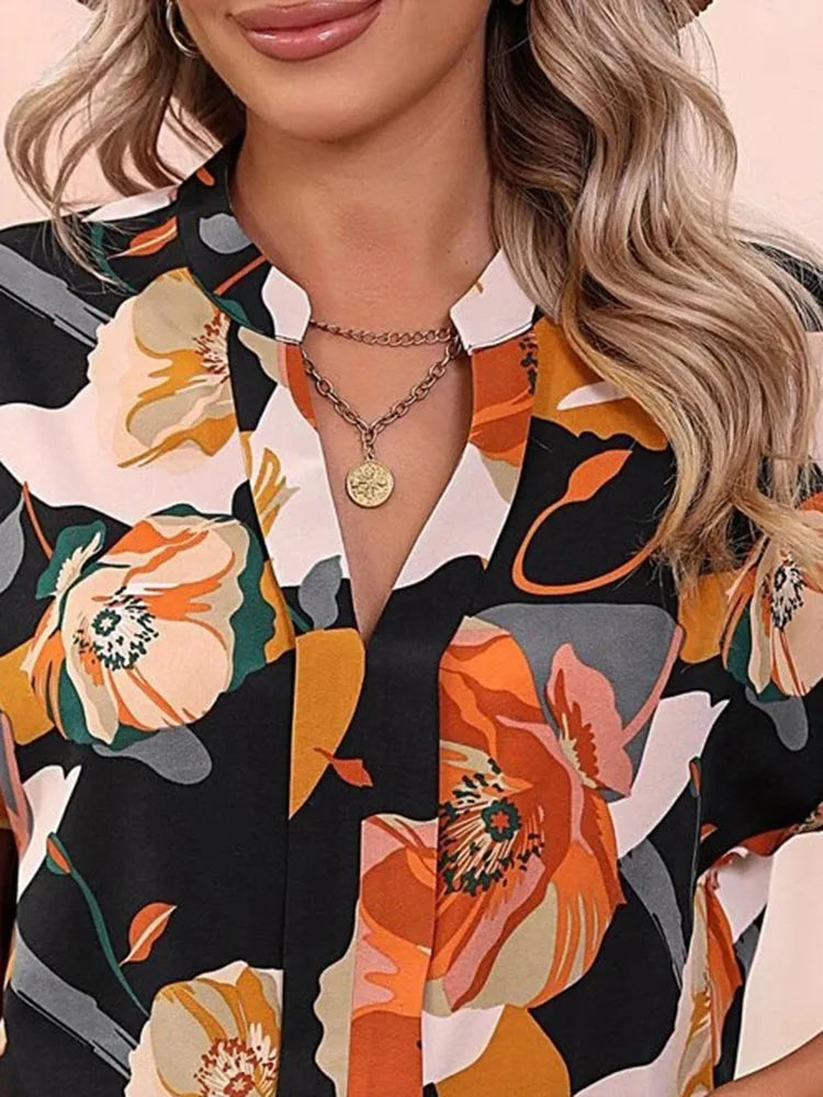 Loraine | Colorful blouse with playful print