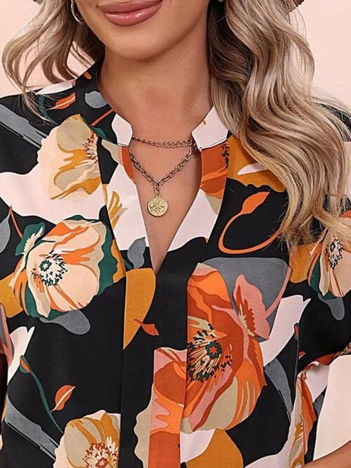 Loraine | Colorful blouse with playful print