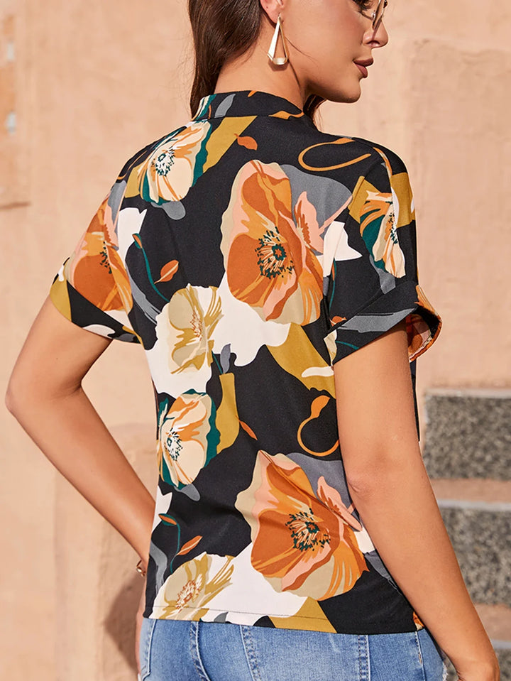 Sheila | Colorful blouse with playful print